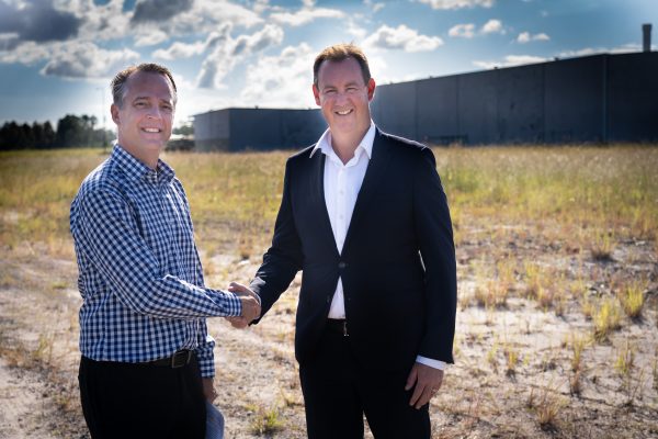 Sunshine Mitre 10 general manager Neil Hutchins with Stockland Senior Economic Development Manager Matthew Byrne at the Aura Sunshine Mitre 10 site - photo by Reflected Image PR
