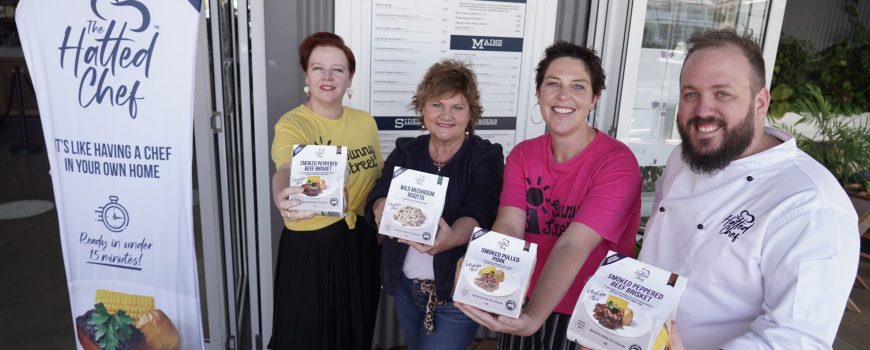 Sunny Street nurse Sonia Goodwin, White's IGA's Roz White, Sunny Street Dr Nova Evans with The Hatted Chef Chris Sell, outside The Dock Mooloolaba, where the product was developed during the COVID shutdown