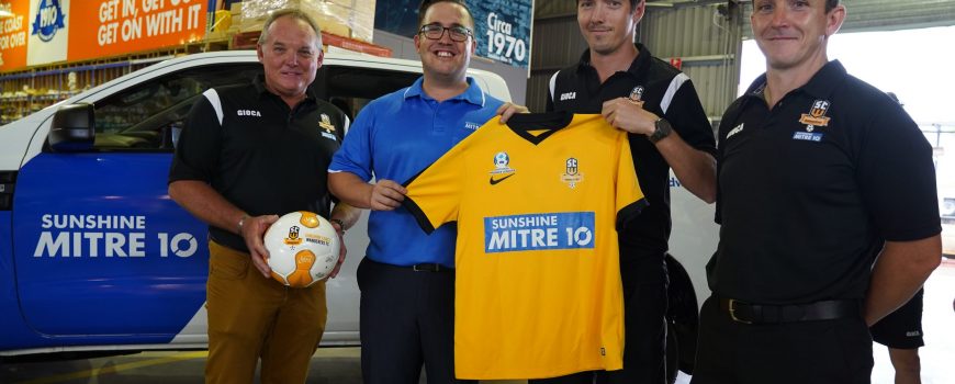 Sunshine-Coast-Wanderers-vice-president-Ian-Grant-Sunshine-Mitre-10s-Nick-Brind-left-and-coach-Paul-Arnison-right-present-2020-jersey-to-Senior-Mens-Captain-Jeremy-Stewart